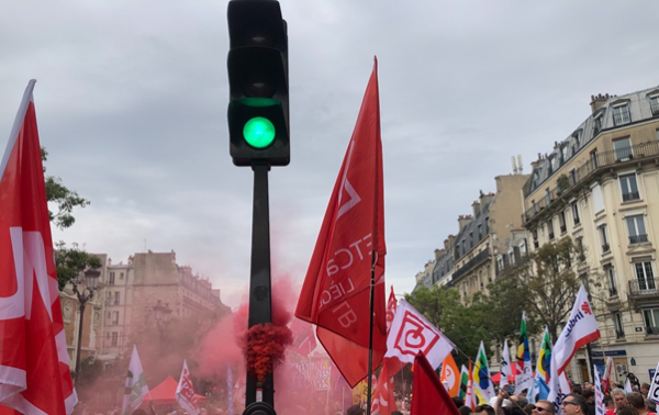 Green light at a trade union rally for fair wages and just transition